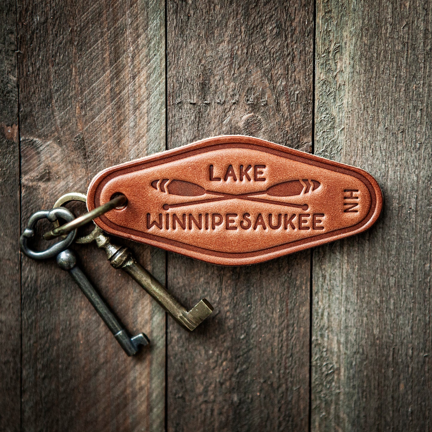 Lake Winnipesaukee Paddles Leather Keychain Motel Style