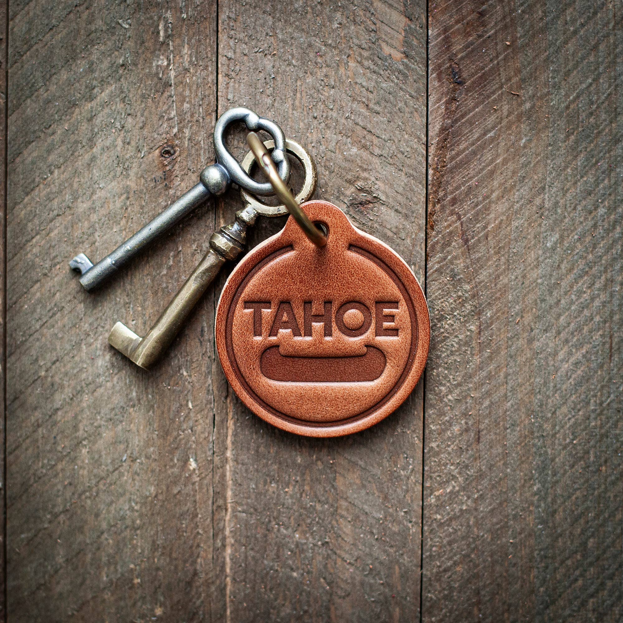 Lake Tahoe Canoe Leather Keychain Circle