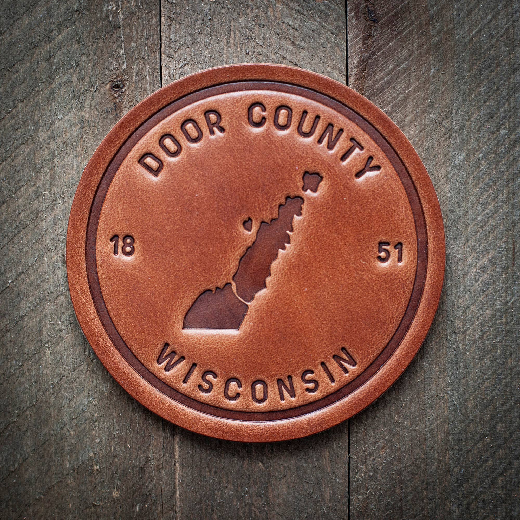 Door County Wisconsin Silhouette Leather Coaster